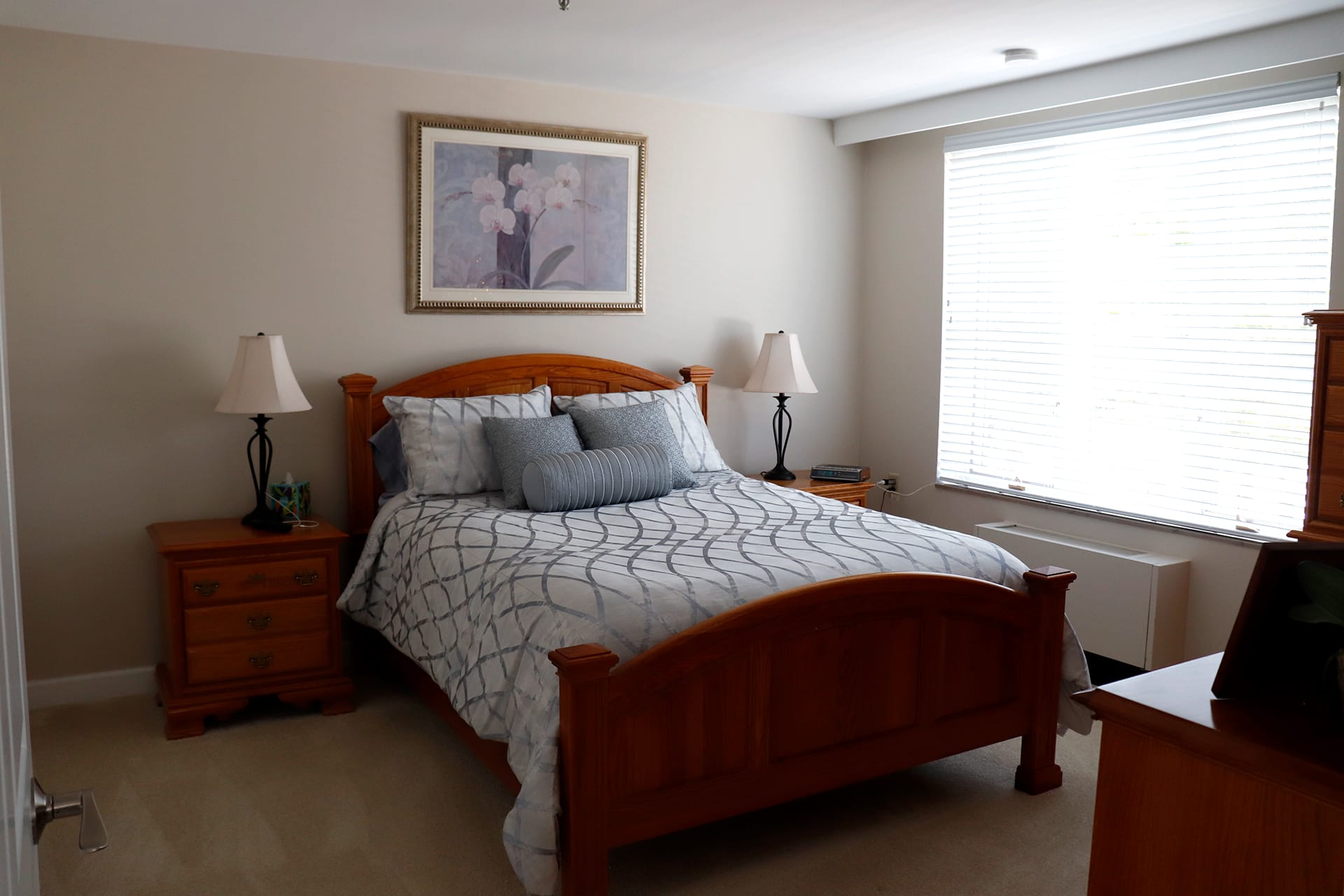 Bedroom of personal care apartment at Oak Crest in DeKalb, Illinois